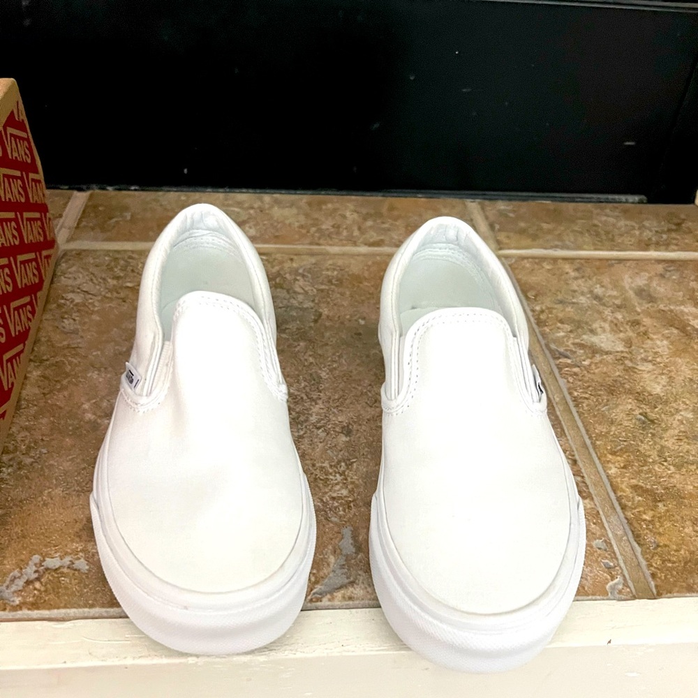Brand new Vans. Never wore. Size 5.5 white